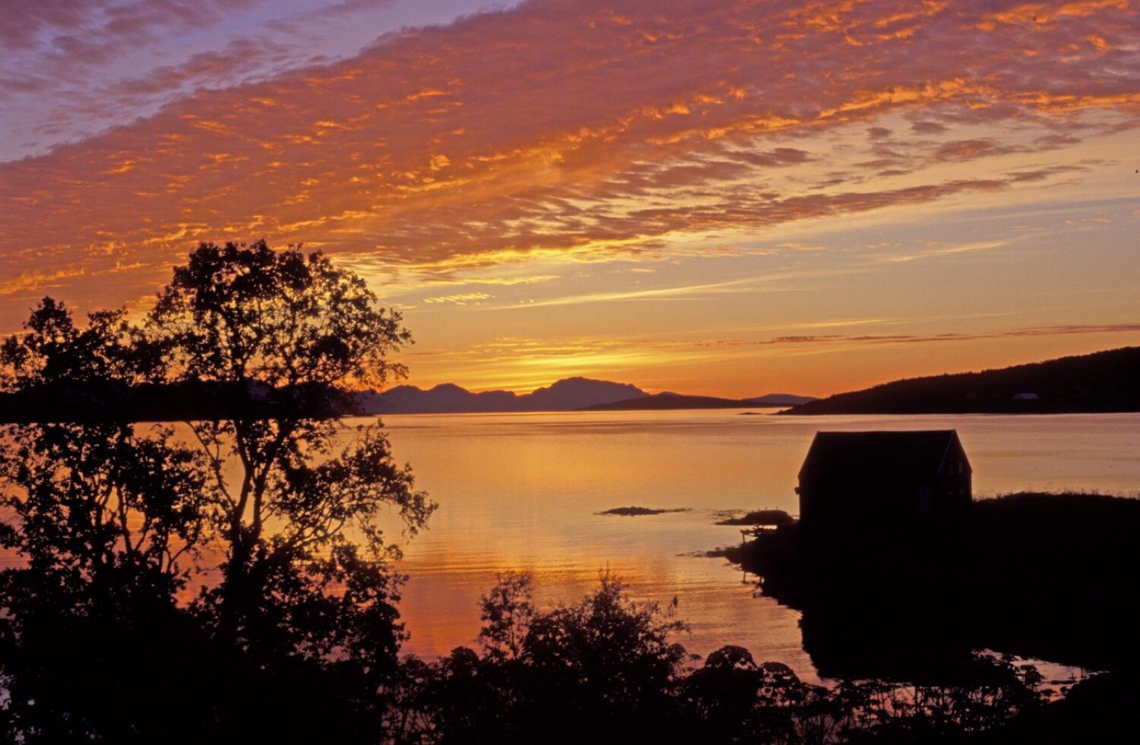 The Altafjord at sunset, with islands on the horizon